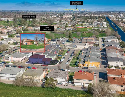 an aerial view of a houses with outdoor space
