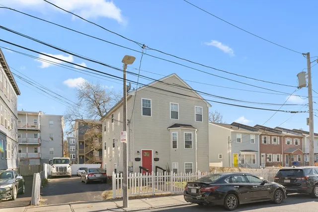 a car parked in front of a building