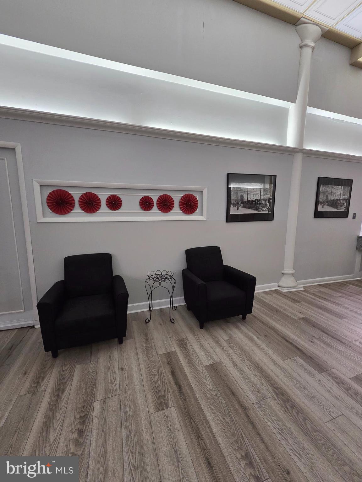 1010 Race Street, Unit 8H Philadelphia, PA 19107 - Photo 7 of 15 a living room with furniture and a flat screen tv