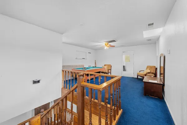 a view of a house with backyard and garden