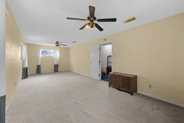 an aerial view of a house with a ocean view