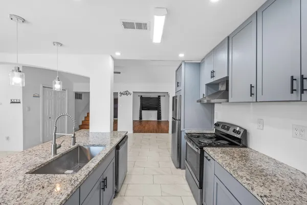 a view of kitchen and windows
