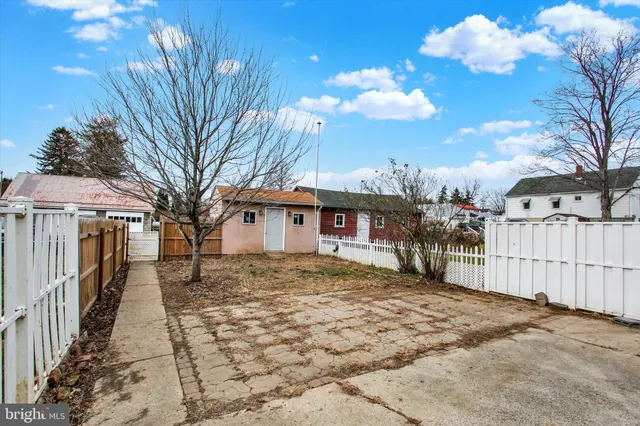 a front view of a house with a garage