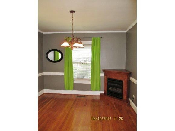 702 Roxboro Street Haw River, NC 27258 - Photo 5 of 24 Corner Gas Fireplace at Dining