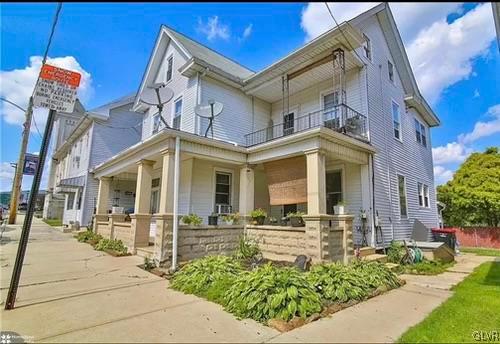 a front view of a building with street view