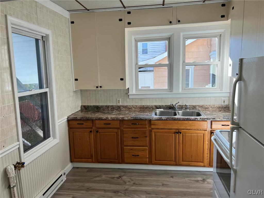 121 South 3rd Street Lehighton Borough, PA 18235 - Photo 12 of 18 a kitchen with stainless steel appliances granite countertop a refrigerator and a sink