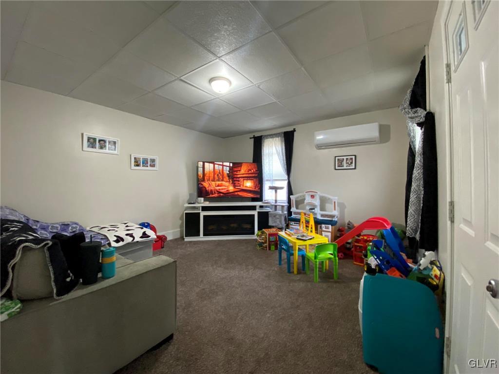121 South 3rd Street Lehighton Borough, PA 18235 - Photo 8 of 18 a living room with furniture and a flat screen tv