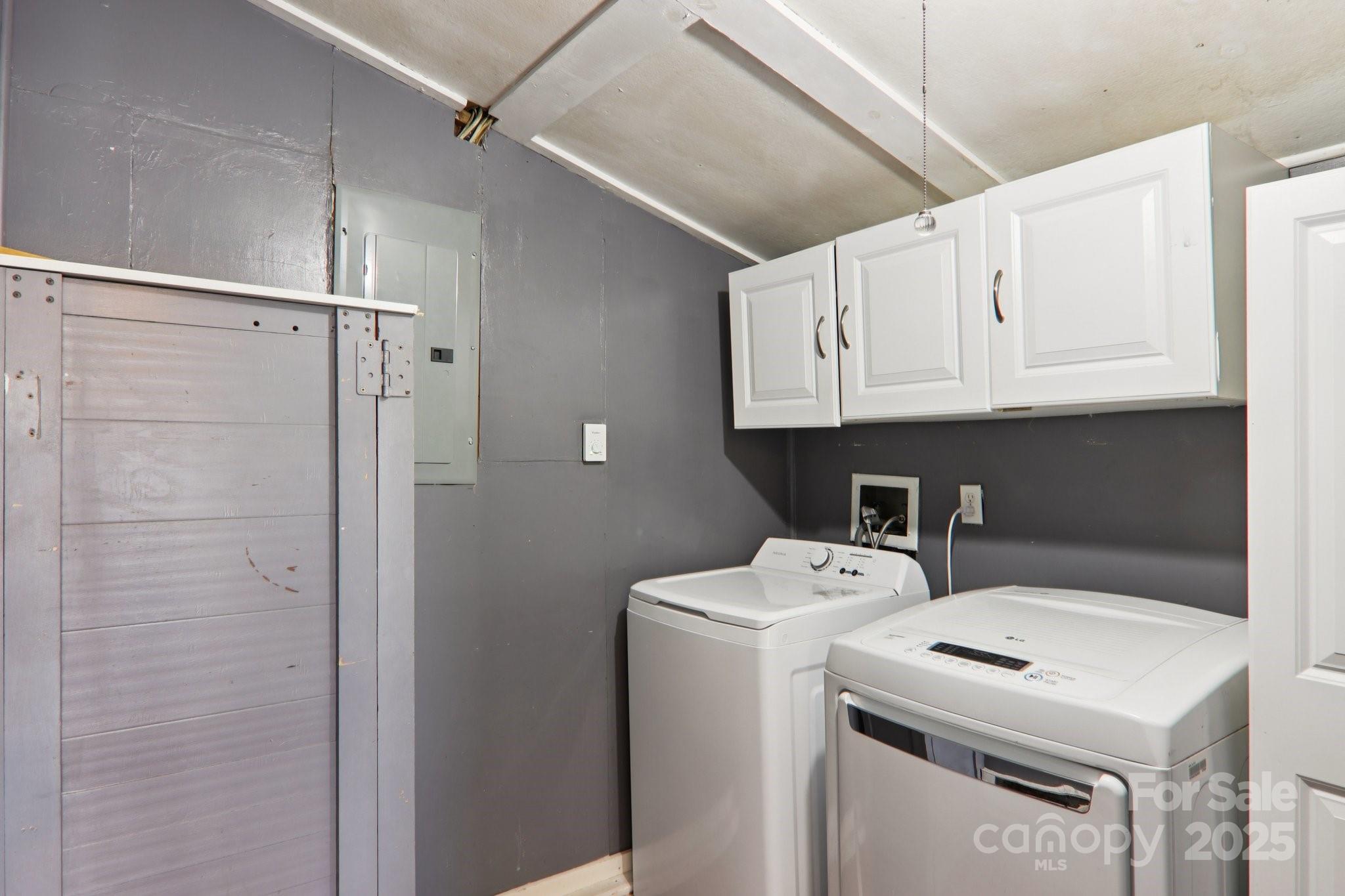 591 Blue Ridge Road Black Mountain, NC 28711 - Photo 24 of 32 a utility room with dryer and washer