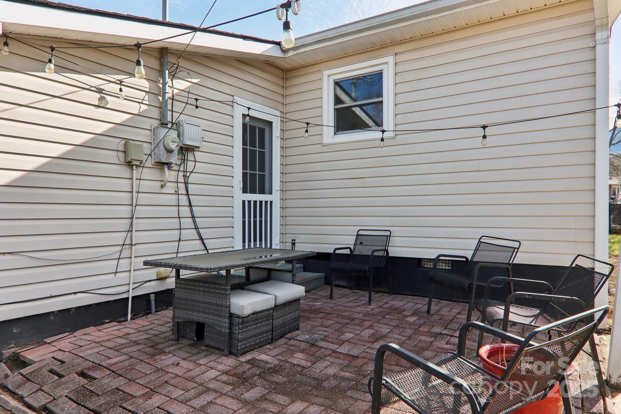 591 Blue Ridge Road Black Mountain, NC 28711 - Photo 26 of 32 a building outdoor space with patio furniture