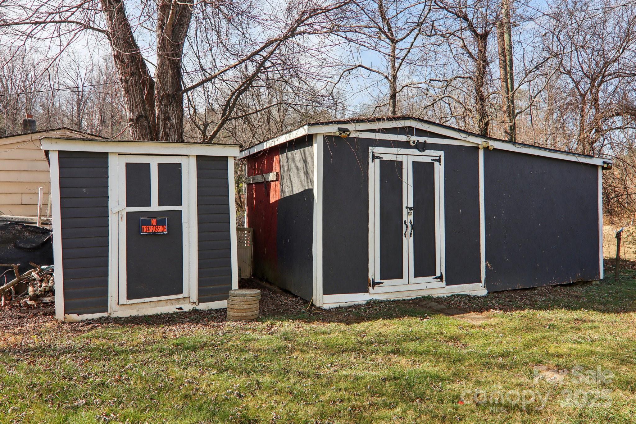 591 Blue Ridge Road Black Mountain, NC 28711 - Photo 28 of 32 a view of a entrance gate of the house