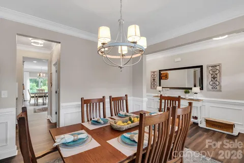 a kitchen with sink and cabinets