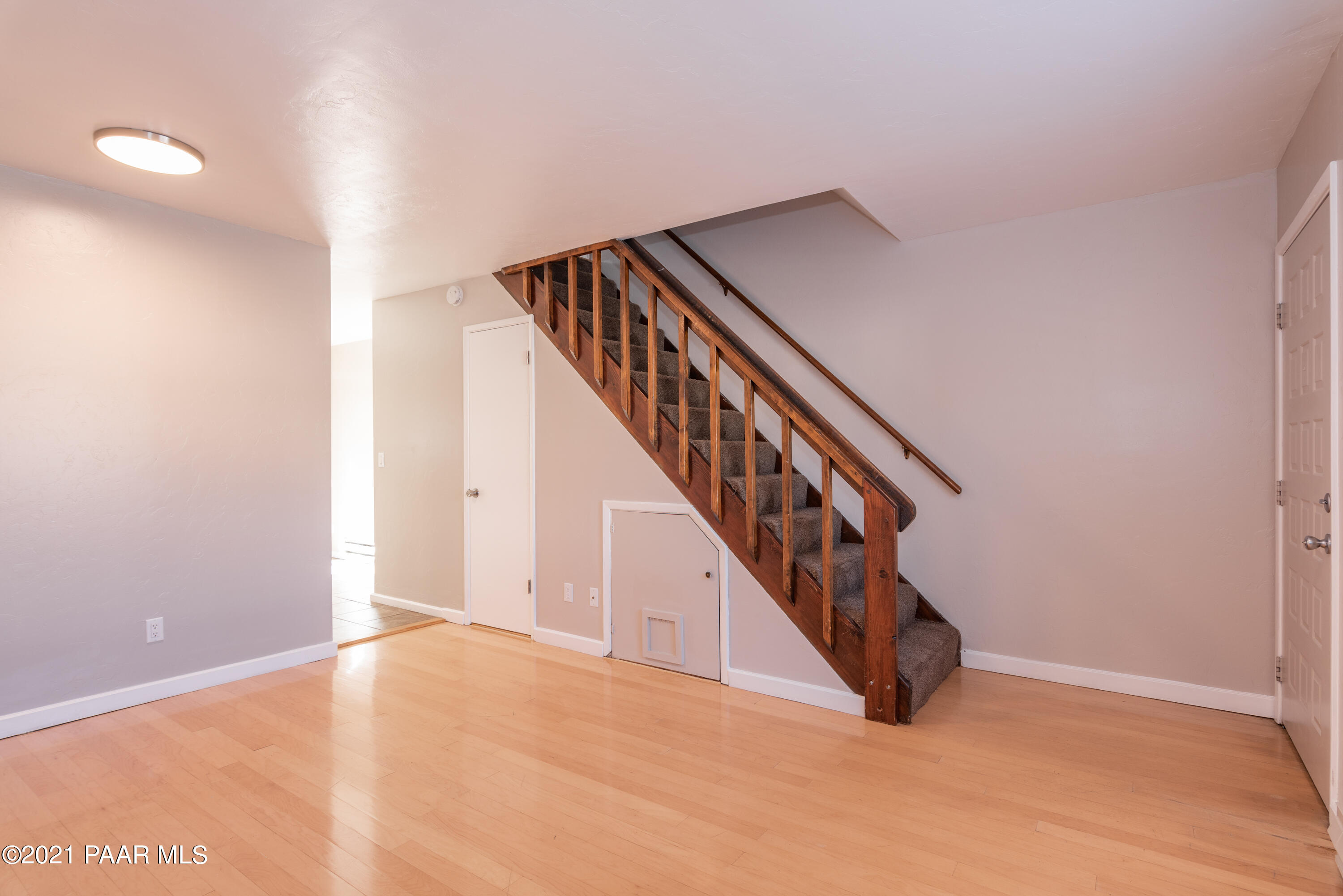 845 Sunset Avenue, Unit D Prescott, AZ 86305 - Photo 3 of 18 a view of an entryway with staircase