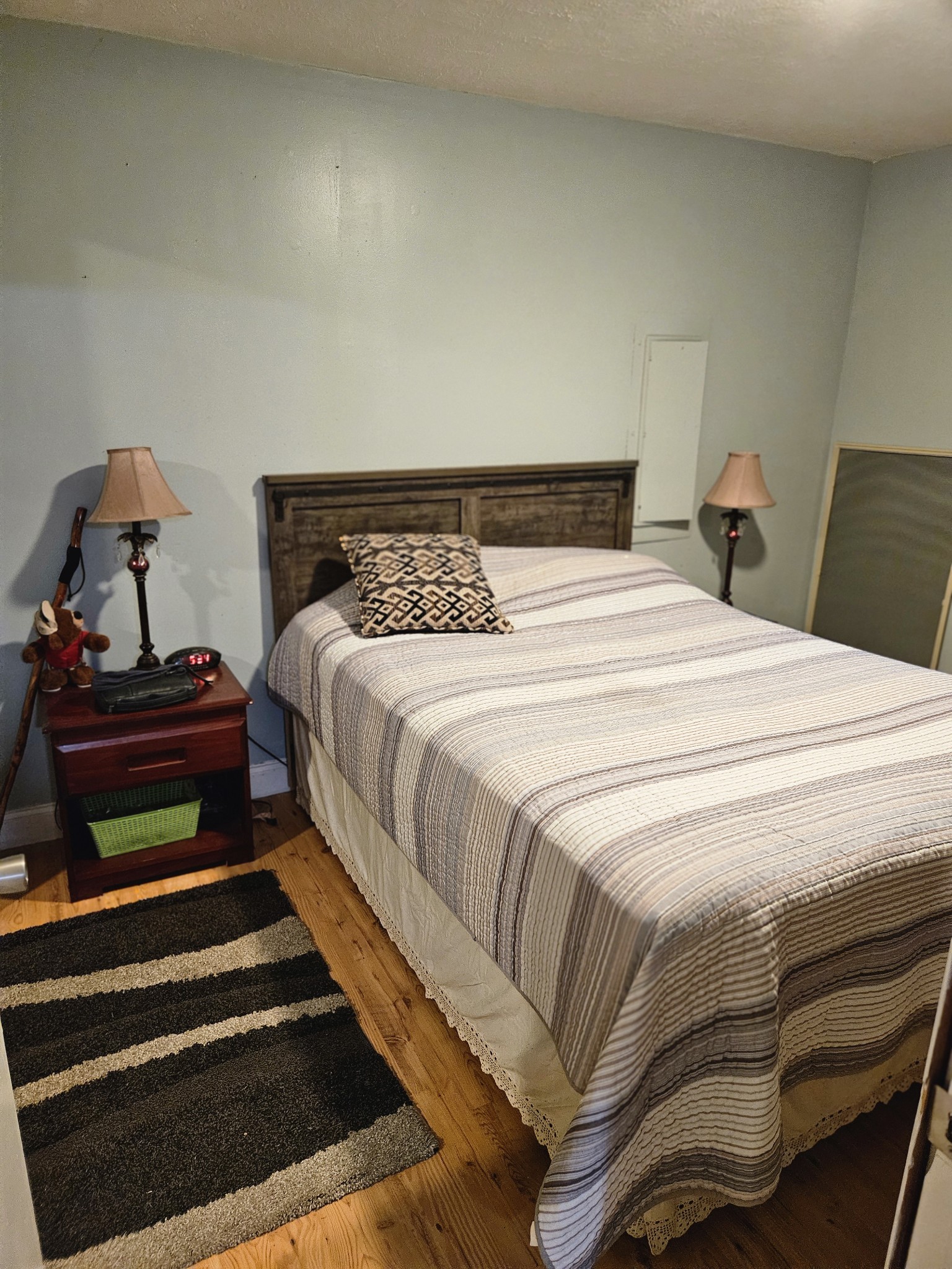 189 Sunset View Estill Springs, TN 37330 - Photo 15 of 22 a bedroom with a bed and a mirror