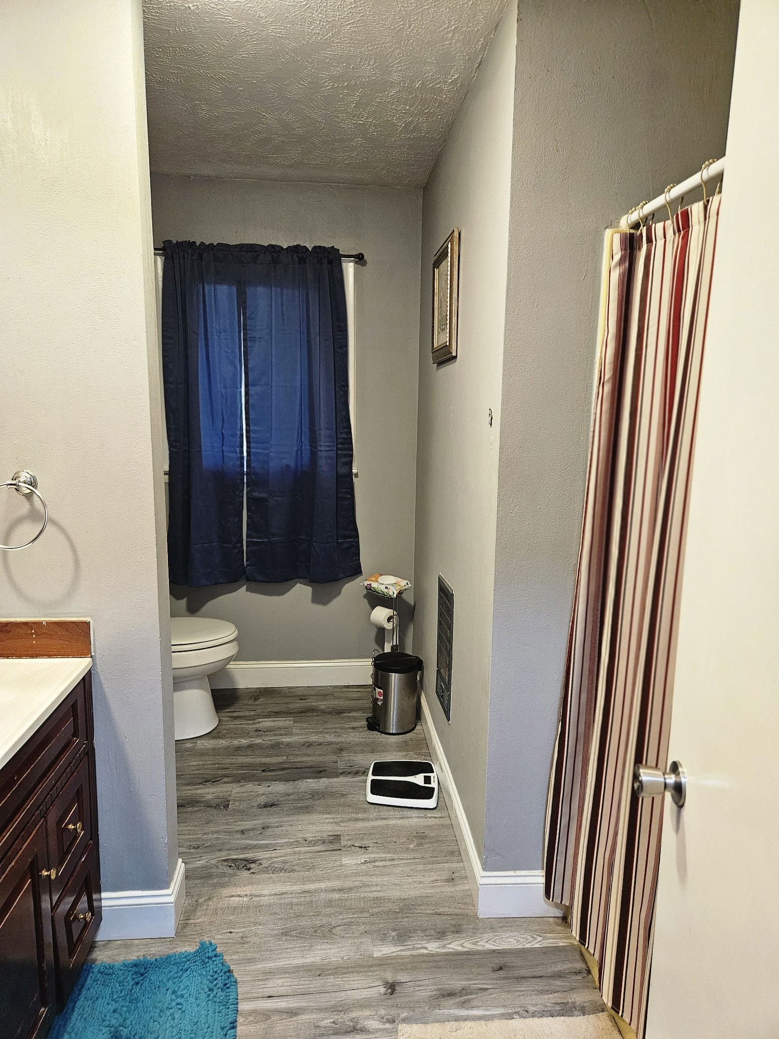 189 Sunset View Estill Springs, TN 37330 - Photo 18 of 22 a view of a hallway with wooden floor and staircase