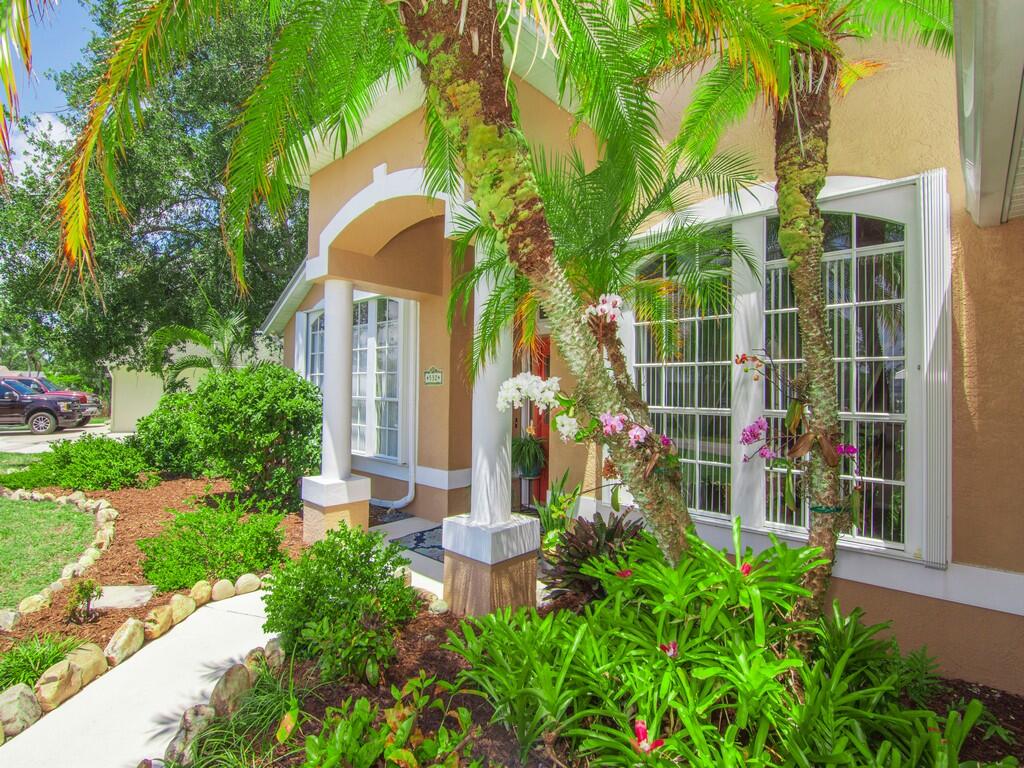 532 Southeast Cliff Road Port St. Lucie, FL 34984 - Photo 4 of 43 beautiful orchids in trees