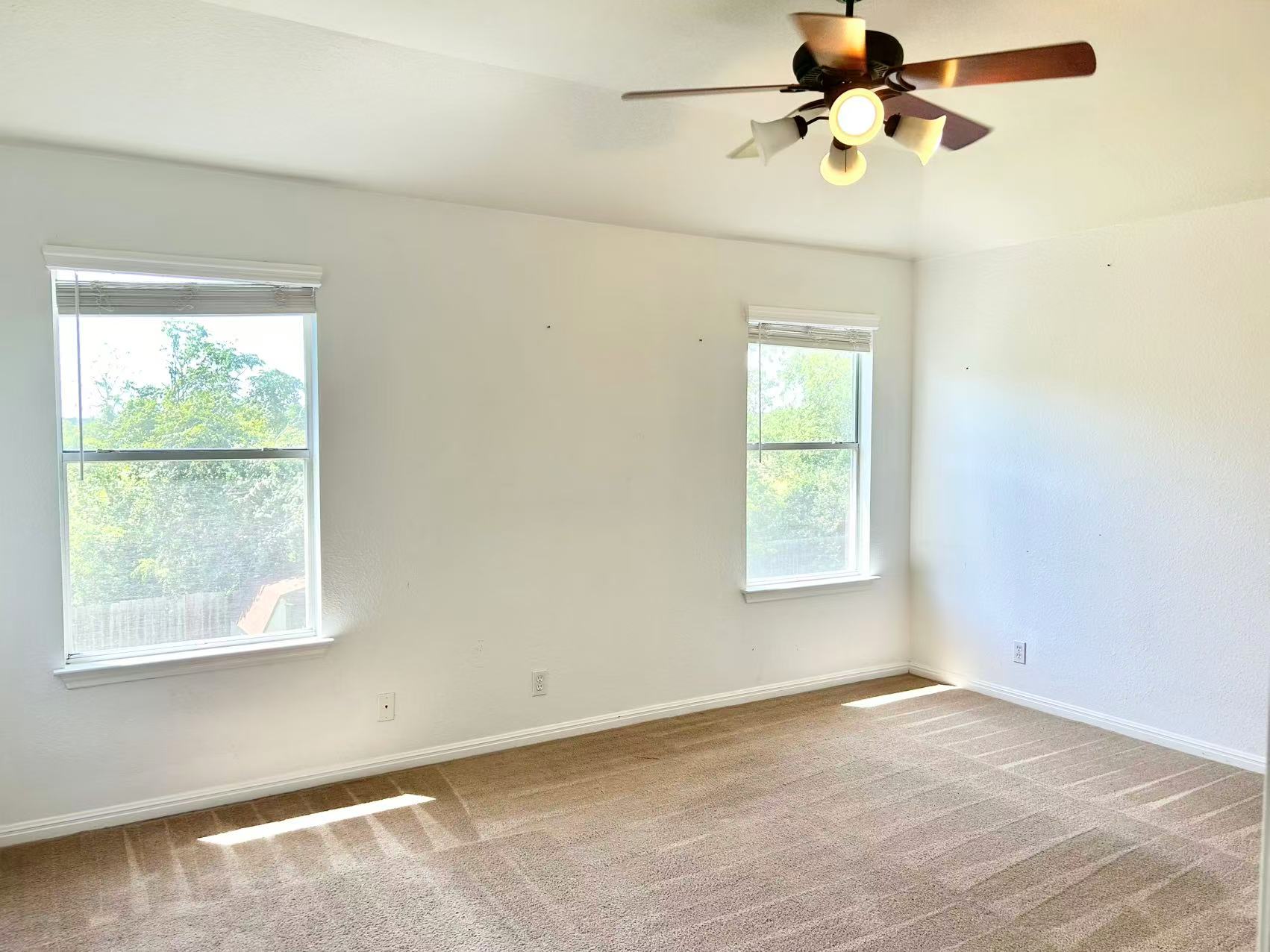 5608 Netleaf Road Austin, TX 78724 - Photo 17 of 26 A well-lit bedroom with ample natural light offers comfort and potential.
