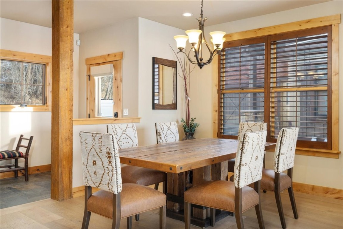 403 Fly Line Drive Silverthorne, CO 80498 - Photo 13 of 35 a view of a dining room with furniture and window