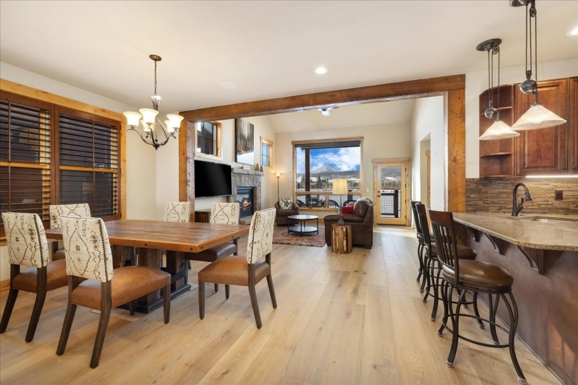 403 Fly Line Drive Silverthorne, CO 80498 - Photo 14 of 35 a view of a dining room with furniture window and outside view