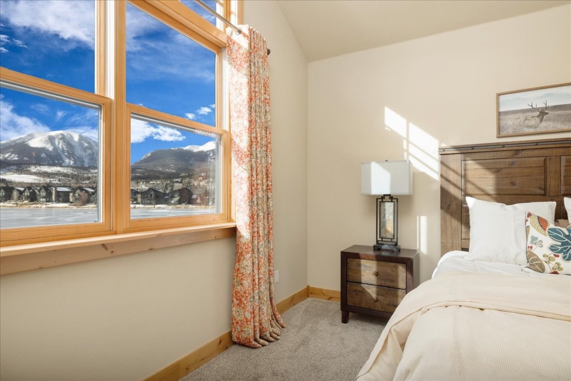 403 Fly Line Drive Silverthorne, CO 80498 - Photo 17 of 35 a bedroom with furniture and a window