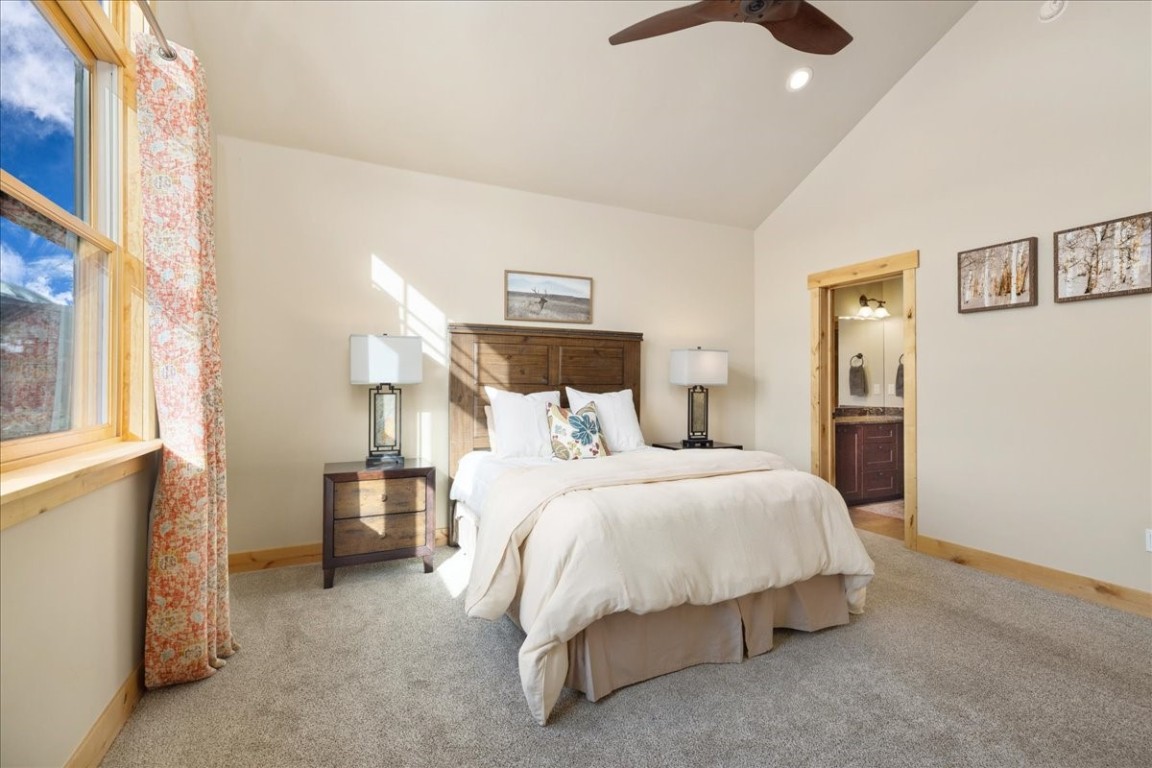 403 Fly Line Drive Silverthorne, CO 80498 - Photo 18 of 35 a bed room with a bed and a night stand