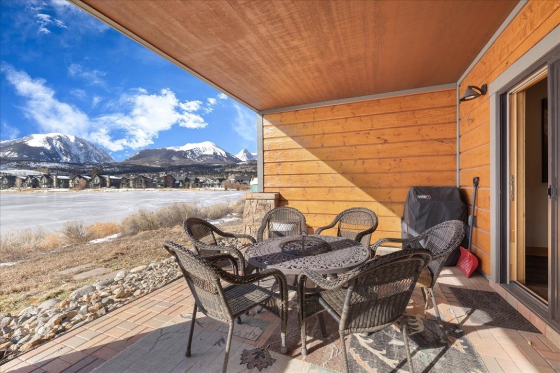 403 Fly Line Drive Silverthorne, CO 80498 - Photo 29 of 35 a view of a lake with table and chairs