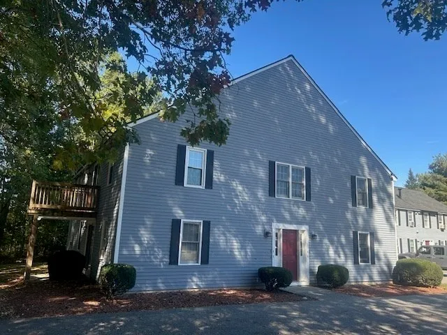 a front view of a house with yard