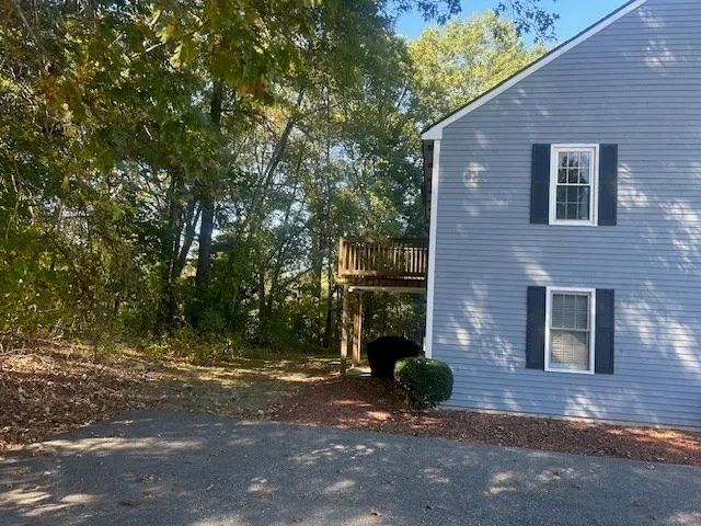 a view of a brick house with a street
