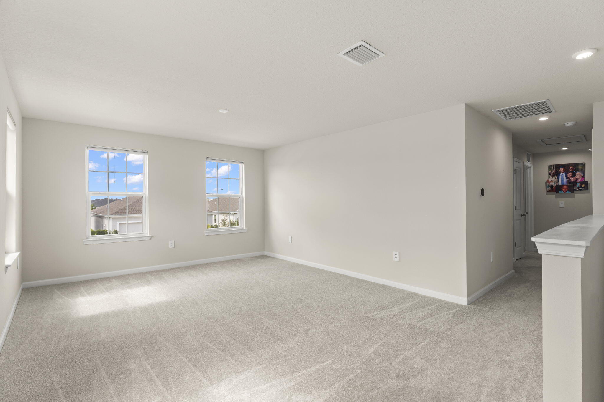 12291 Southwest Forli Way Port Port St. Lucie, FL 34987 - Photo 20 of 48 a view of an empty room with a window