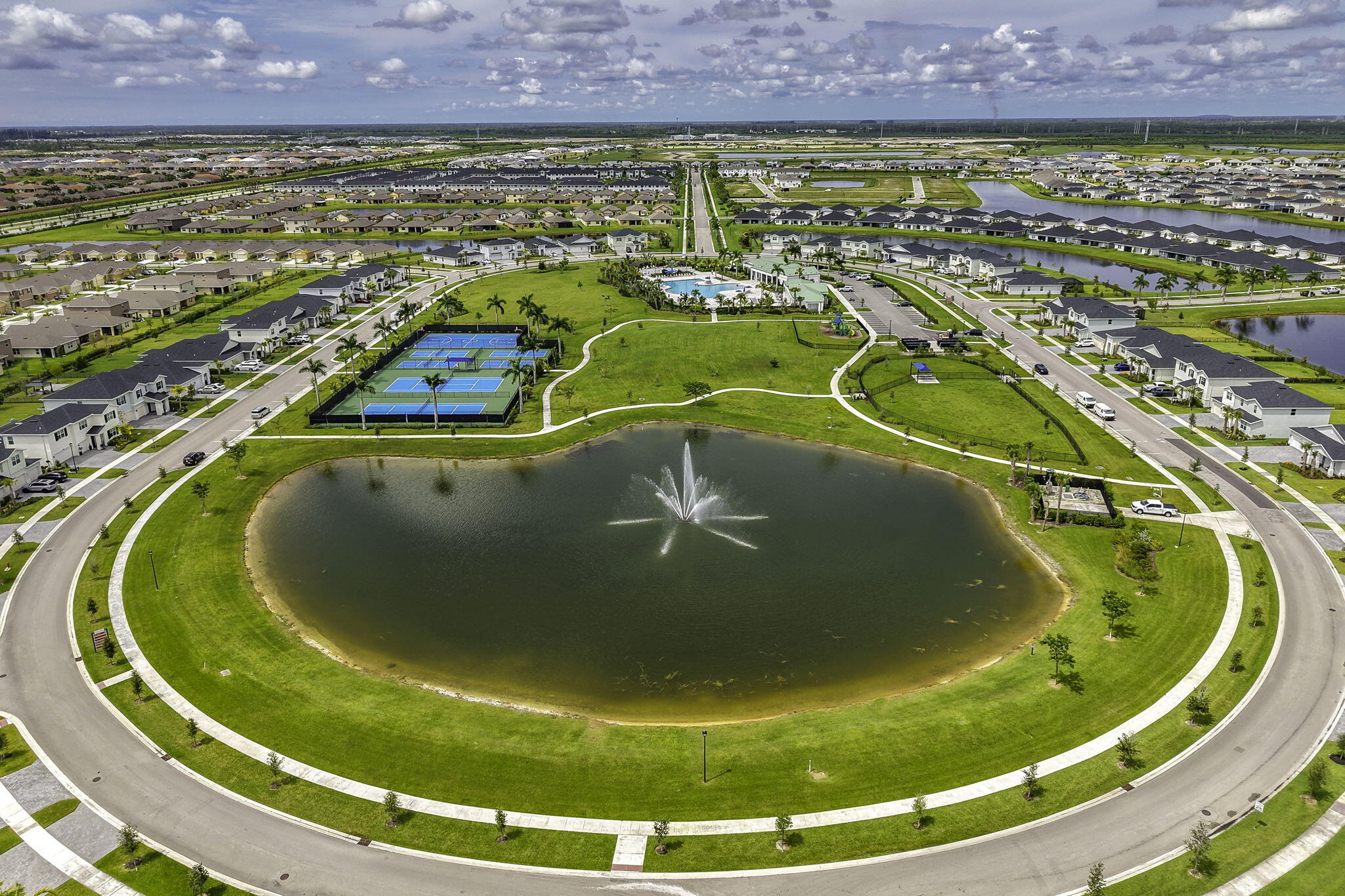 12291 Southwest Forli Way Port Port St. Lucie, FL 34987 - Photo 40 of 48 an aerial view of a swimming pool