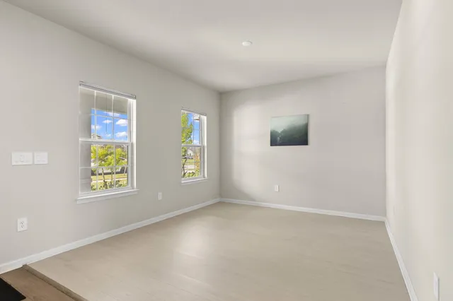 an empty room with windows