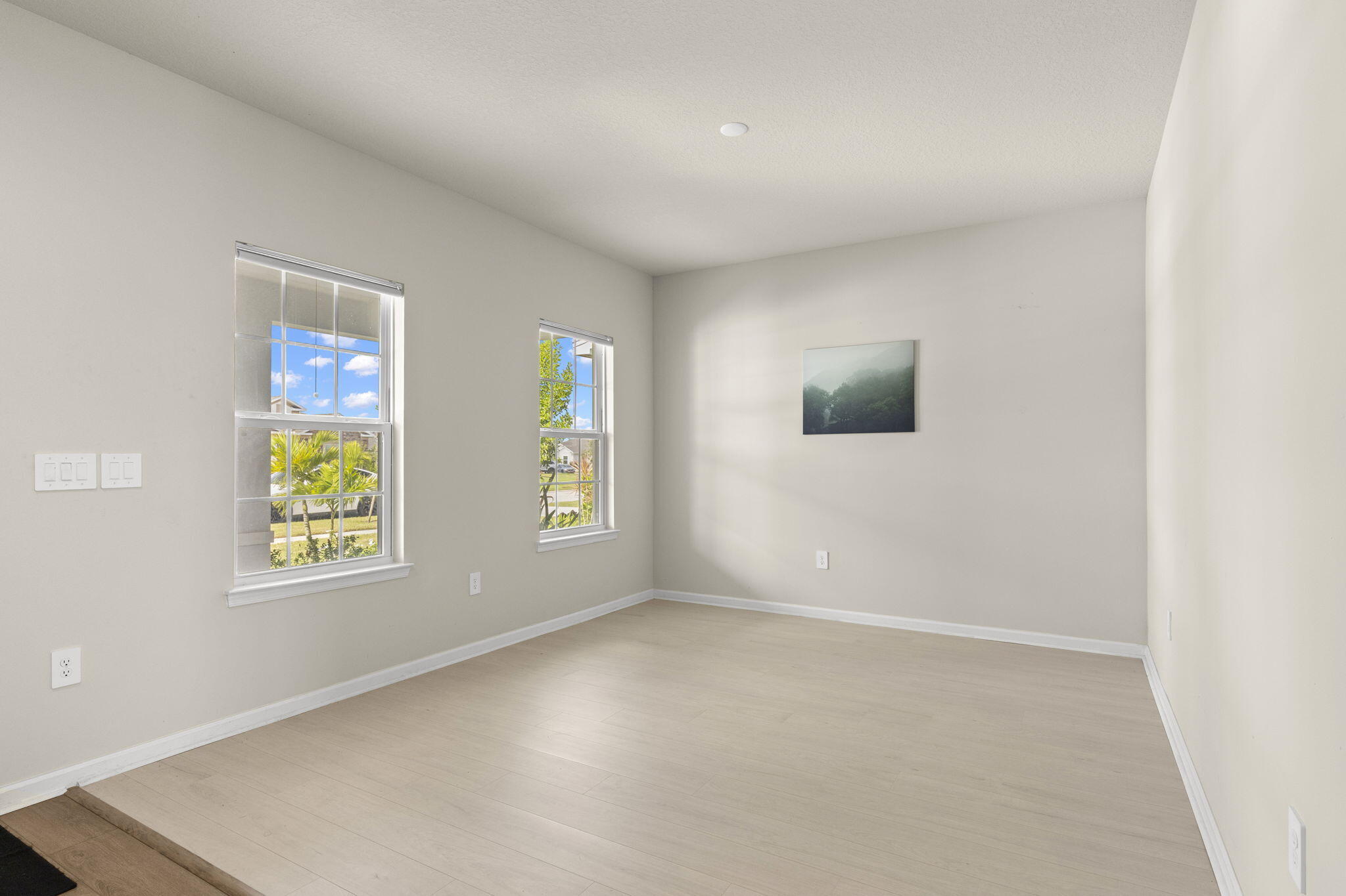 12291 Southwest Forli Way Port Port St. Lucie, FL 34987 - Photo 6 of 48 an empty room with windows