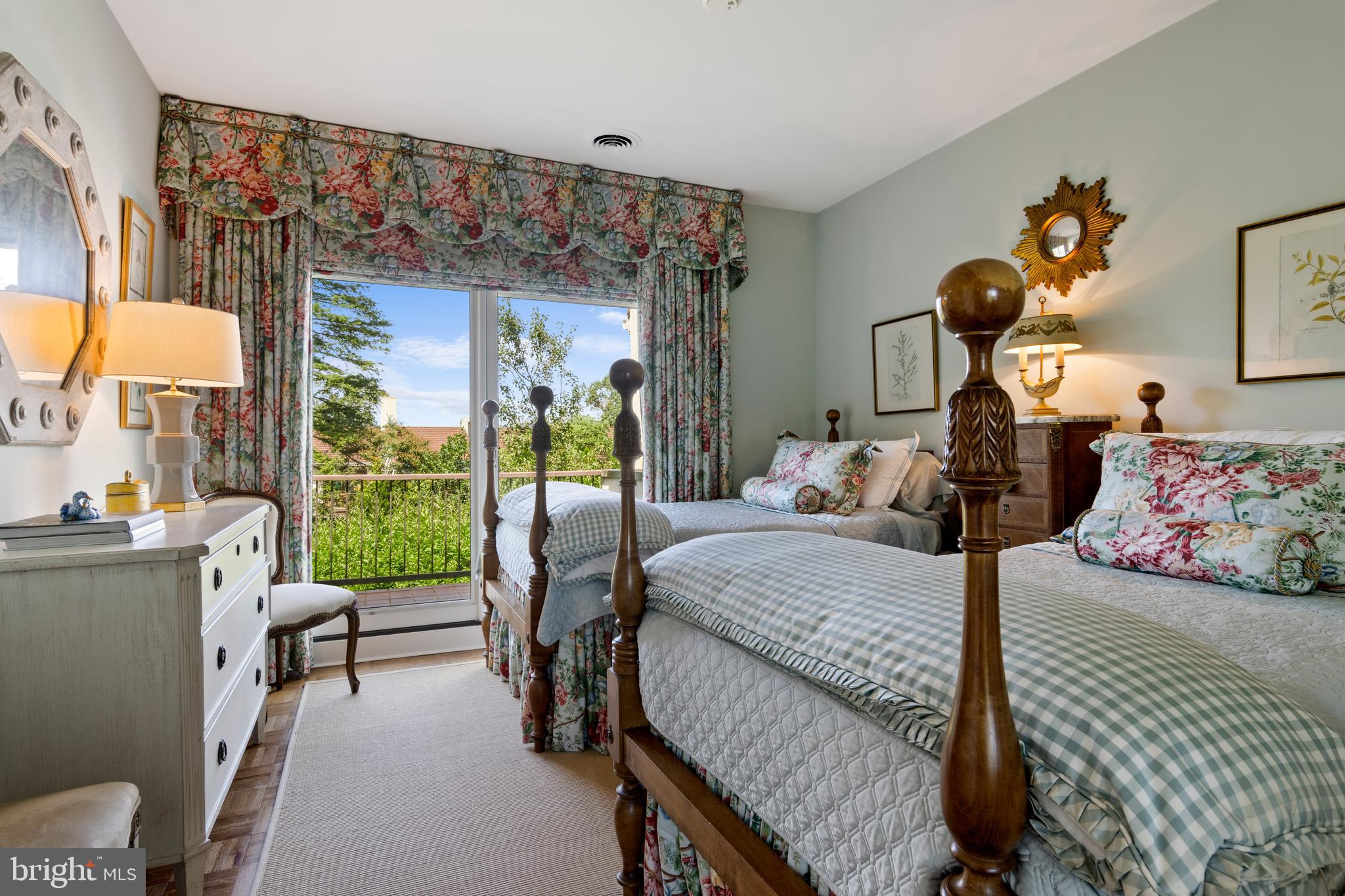 4 Brettagne, Unit 4 Devon, PA 19333 - Photo 20 of 26 a bedroom with a bed and large windows