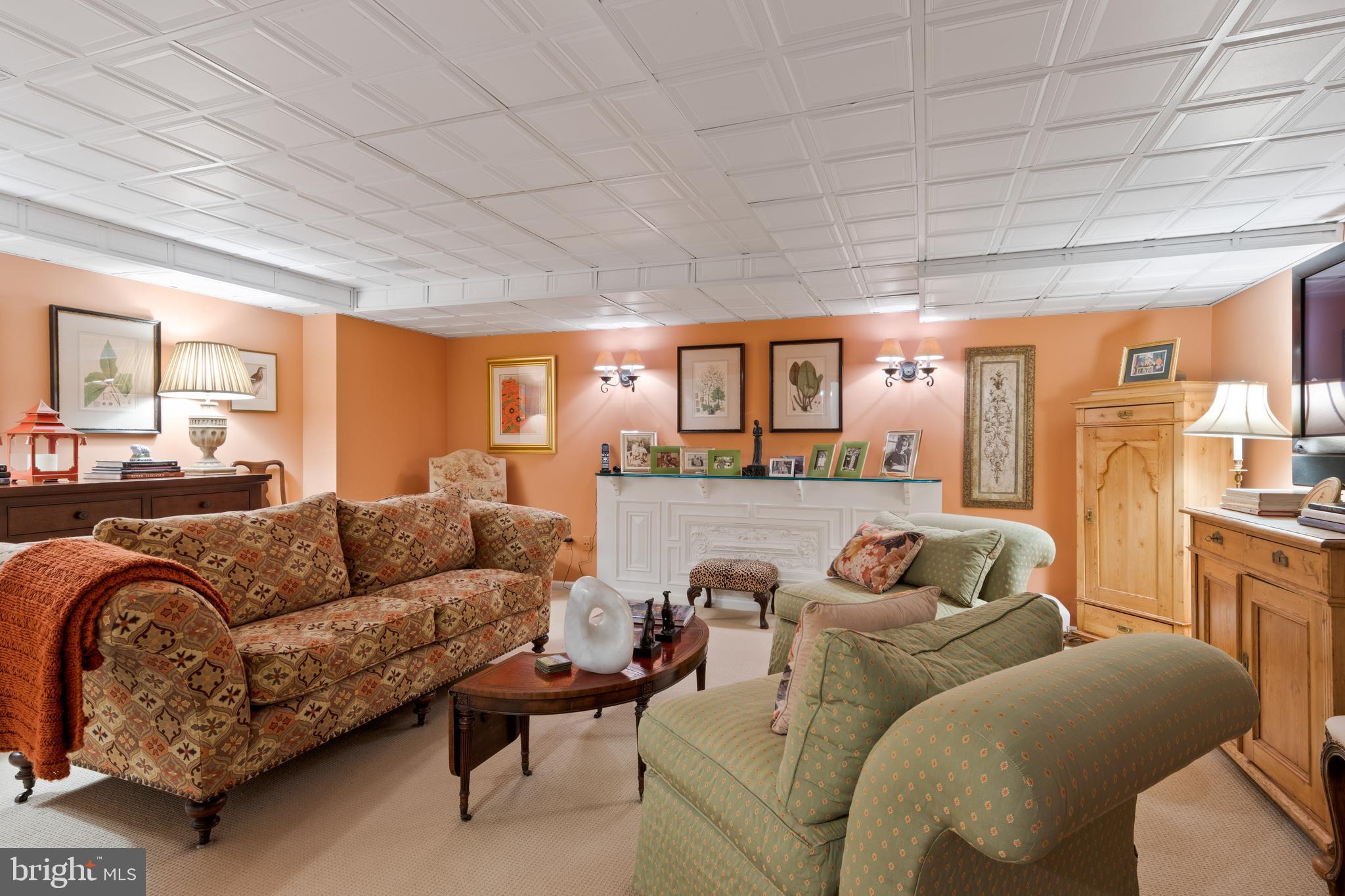 4 Brettagne, Unit 4 Devon, PA 19333 - Photo 23 of 26 a living room with furniture and a large window