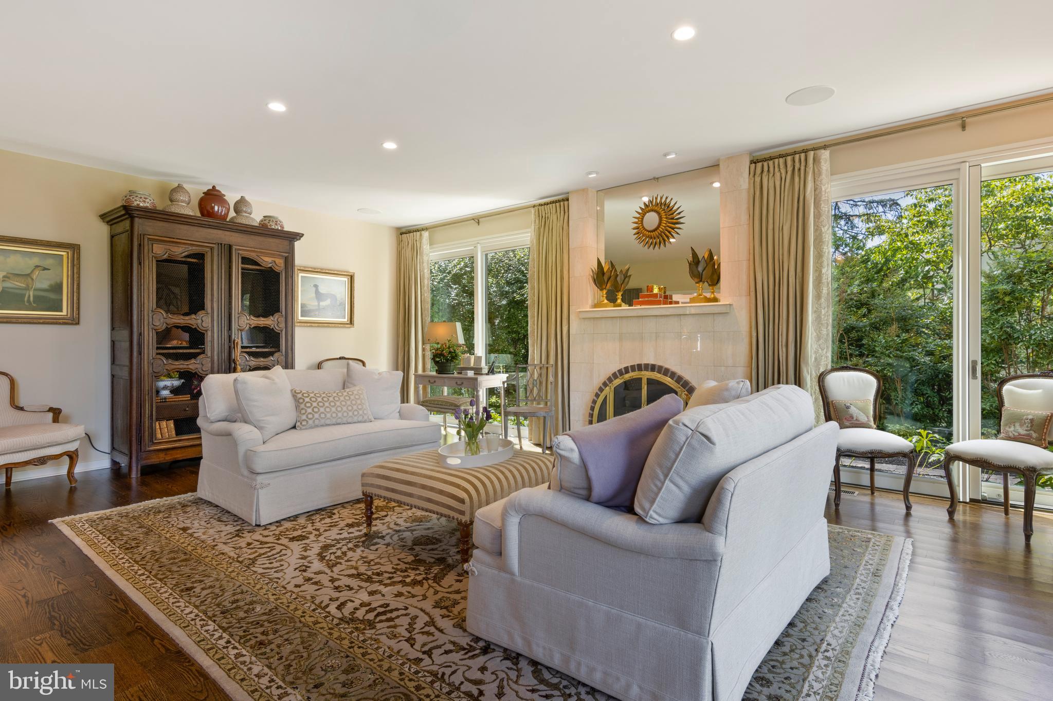 4 Brettagne, Unit 4 Devon, PA 19333 - Photo 6 of 26 a living room with furniture fireplace and a large window