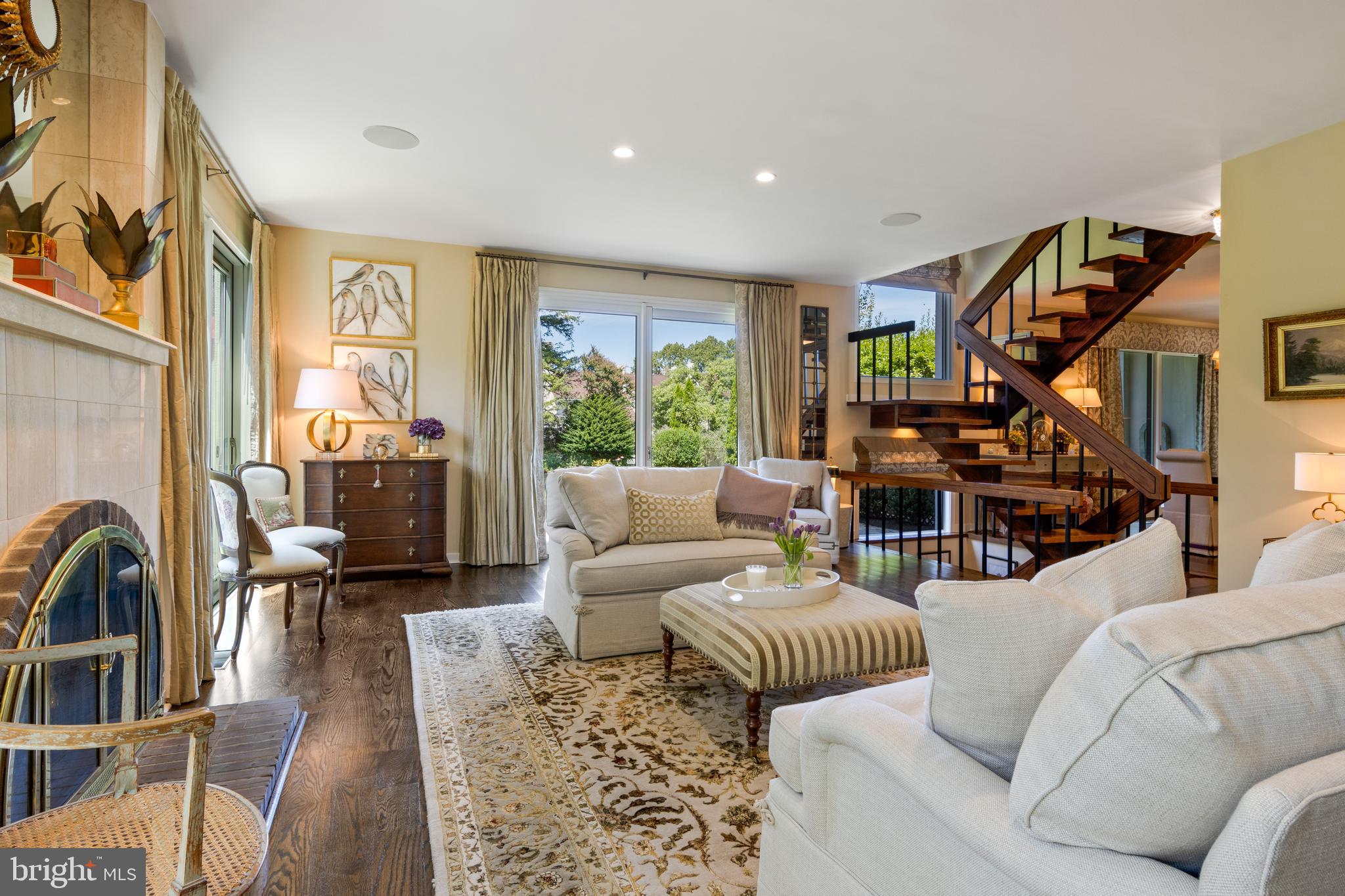 4 Brettagne, Unit 4 Devon, PA 19333 - Photo 7 of 26 a living room with furniture or couch and a wooden floor