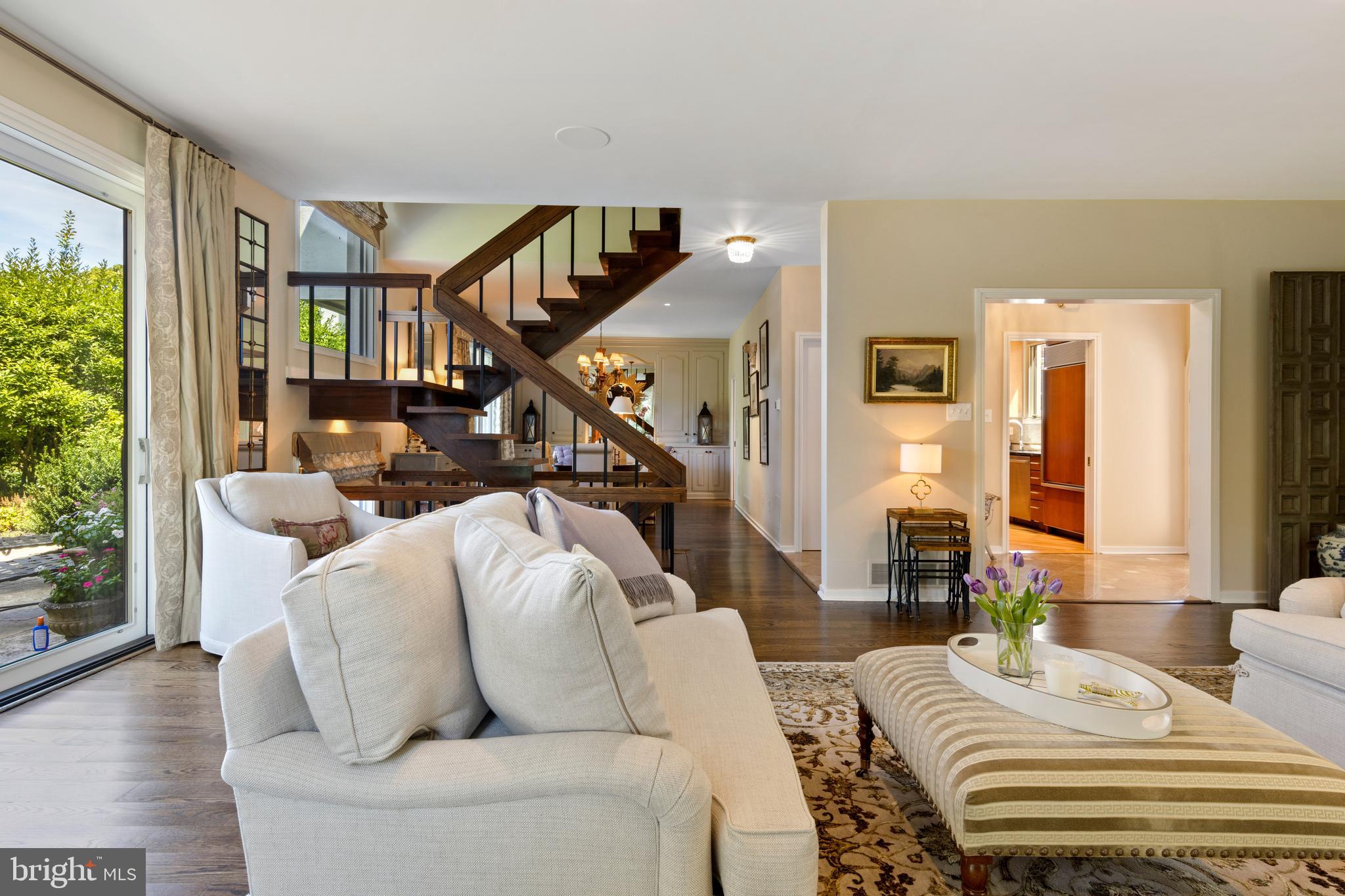 4 Brettagne, Unit 4 Devon, PA 19333 - Photo 8 of 26 a living room with furniture and hard wood flooring