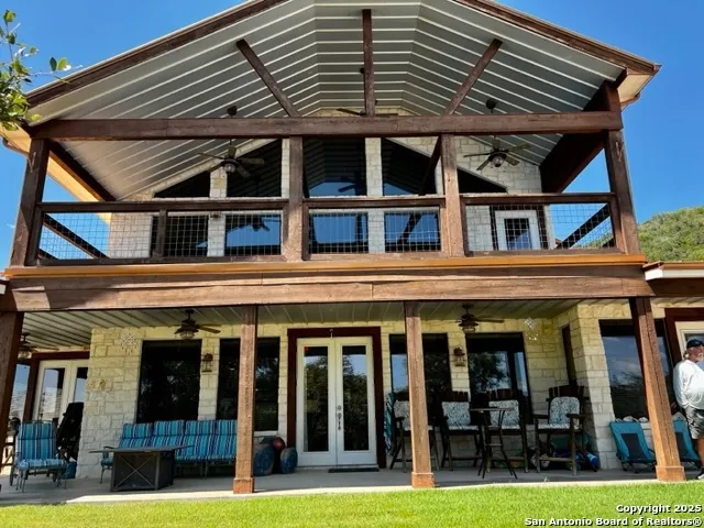 a view of swimming pool with a yard