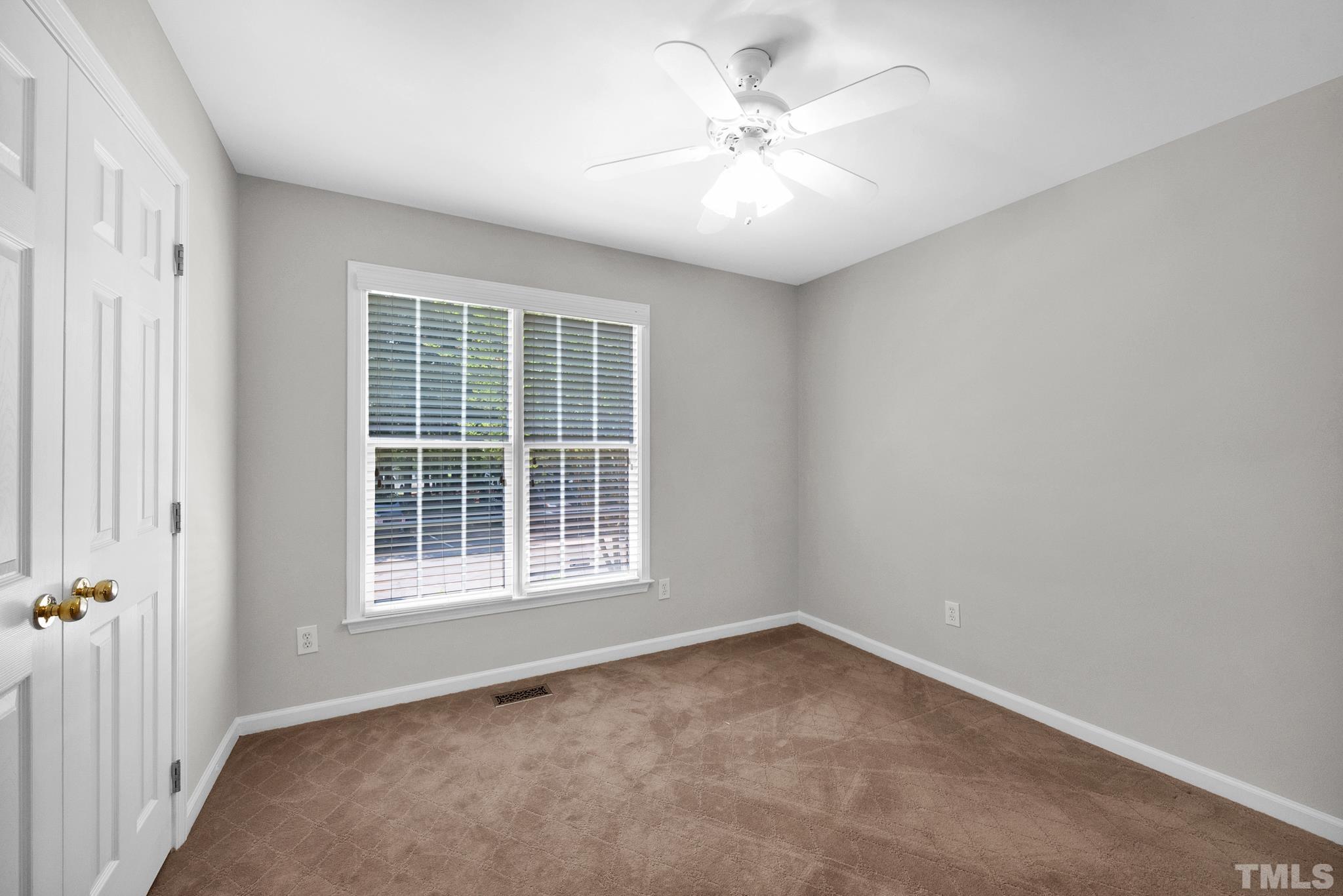 9553 Hanging Rock Road Raleigh, NC 27613 - Photo 18 of 36 an empty room with a window
