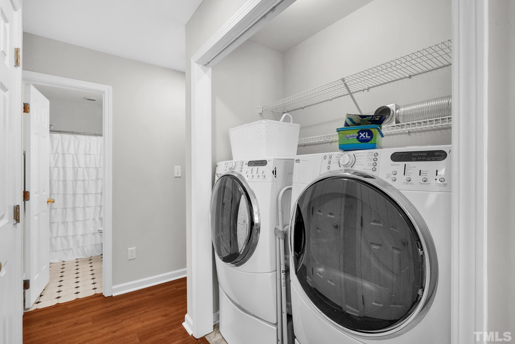 9553 Hanging Rock Road Raleigh, NC 27613 - Photo 26 of 36 a utility room with dryer and washer