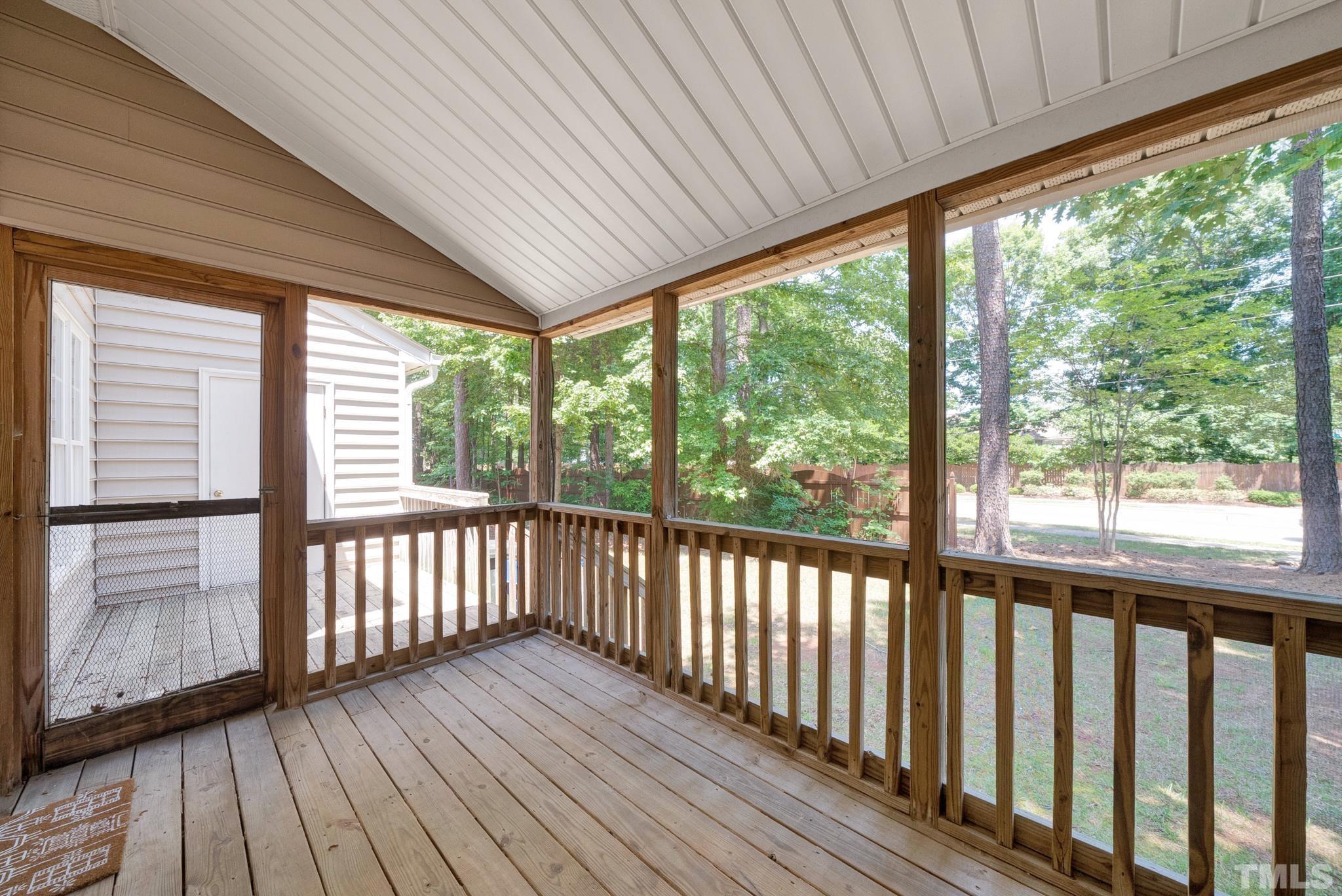 9553 Hanging Rock Road Raleigh, NC 27613 - Photo 28 of 36 a view of a wooden deck