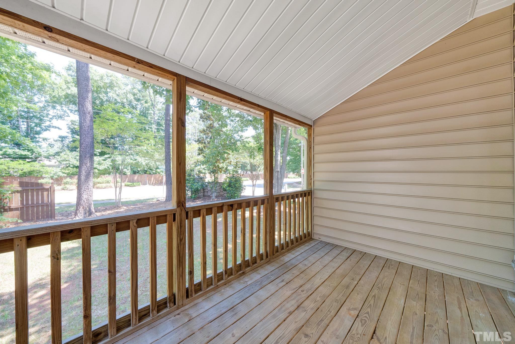 9553 Hanging Rock Road Raleigh, NC 27613 - Photo 29 of 36 a view of a room with wooden floor