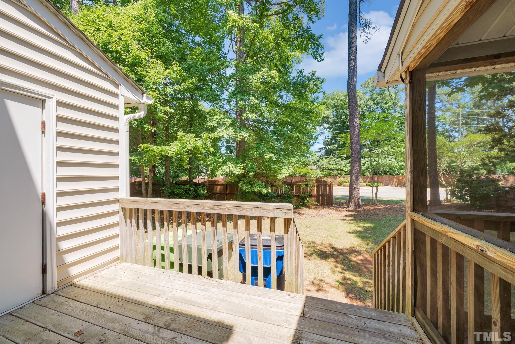 9553 Hanging Rock Road Raleigh, NC 27613 - Photo 30 of 36 a view of a wooden deck