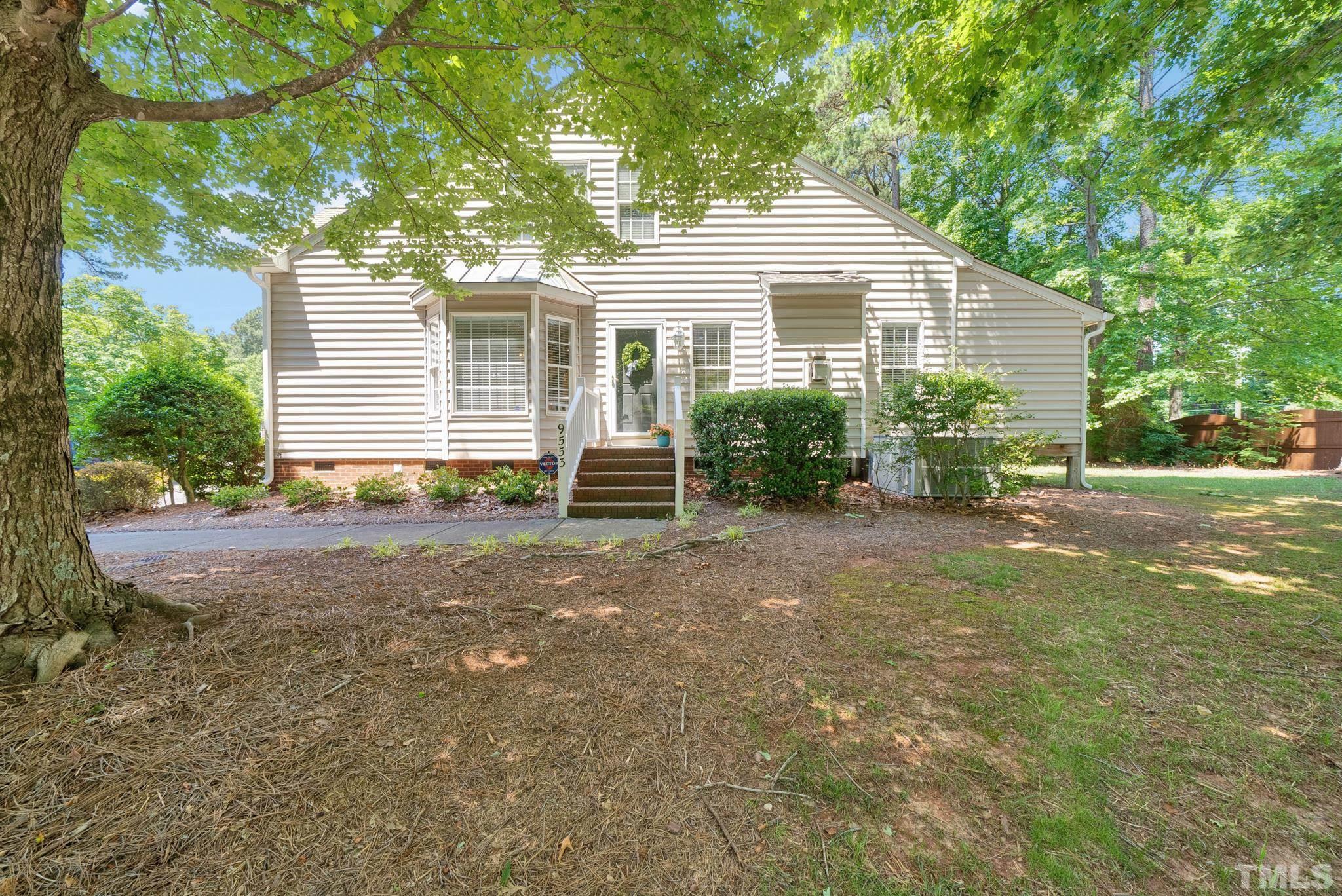 9553 Hanging Rock Road Raleigh, NC 27613 - Photo 33 of 36 a view of a house with yard and a garden