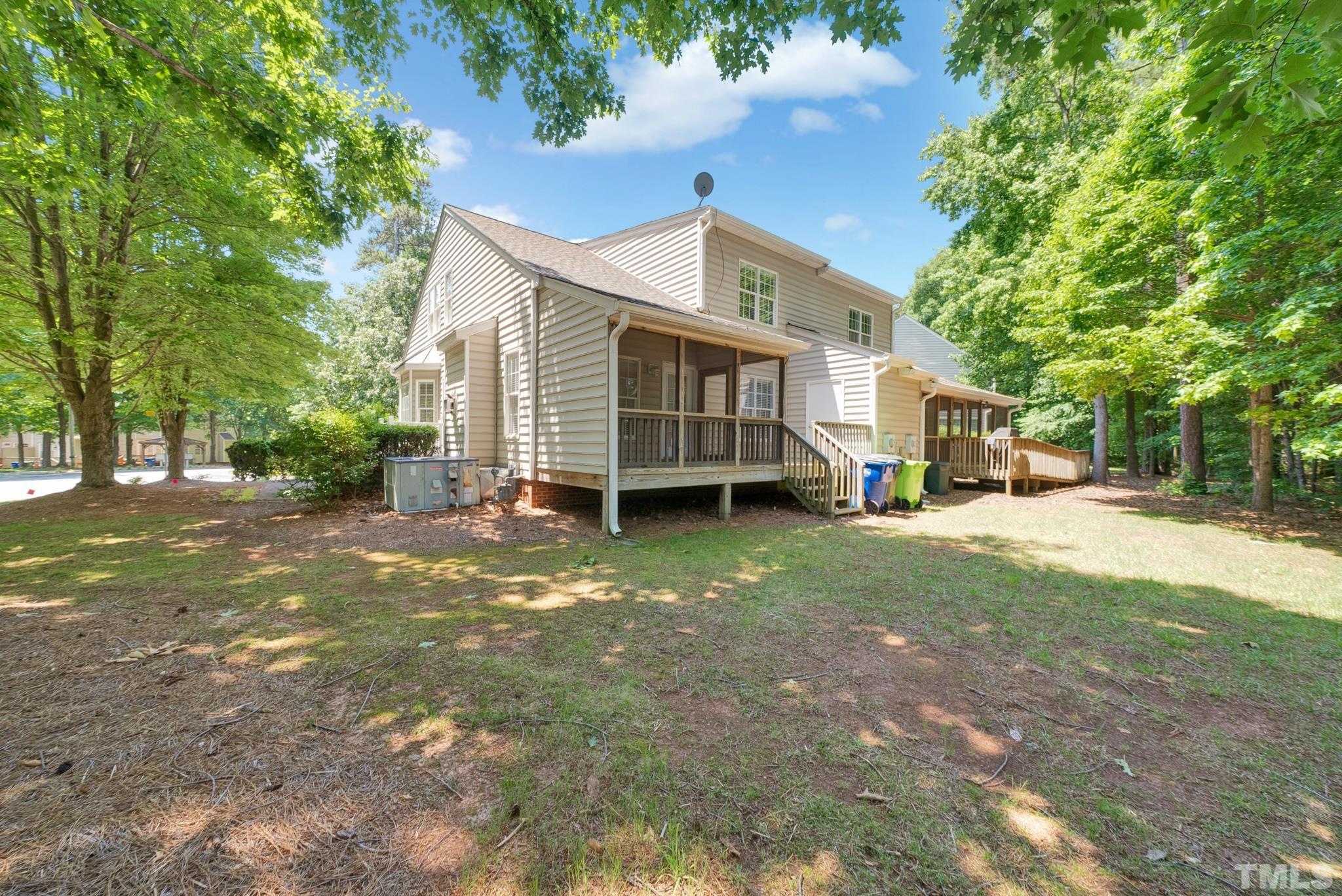 9553 Hanging Rock Road Raleigh, NC 27613 - Photo 36 of 36 a view of a house with a yard