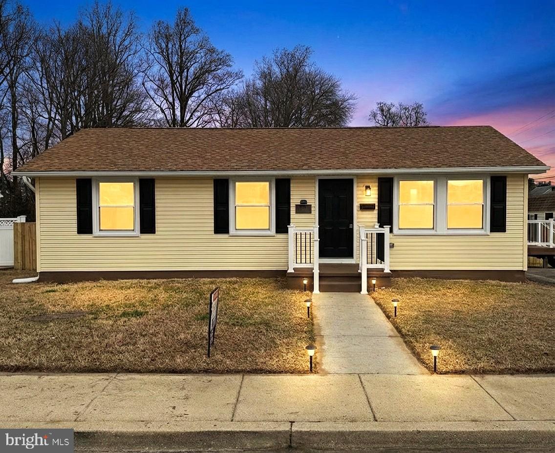 8537 Creek Road Pasadena, MD 21122 - Photo 3 of 24 a view of a house with a outdoor space