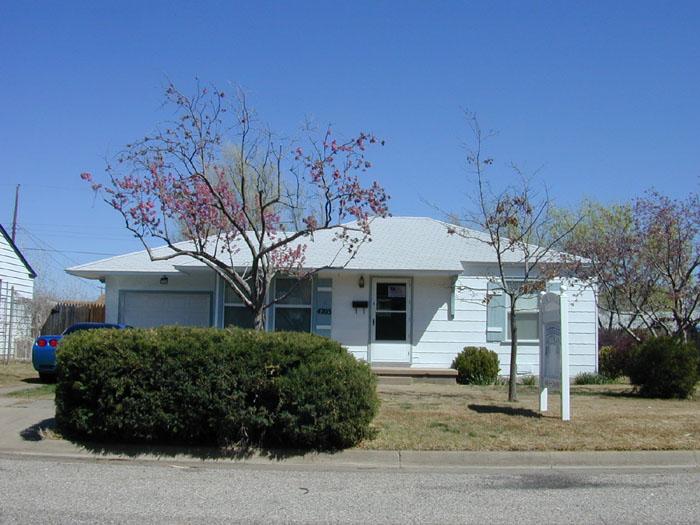 4203 Cline Road Amarillo, TX 79110 - Photo 1 of 11 a front view of a house with a yard