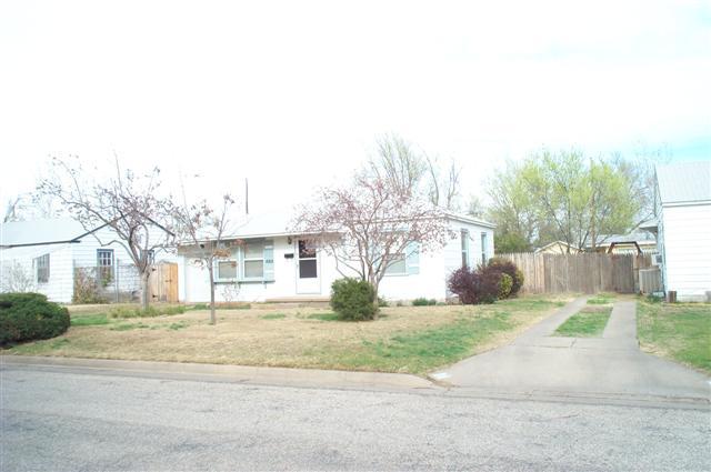 4203 Cline Road Amarillo, TX 79110 - Photo 2 of 11 a view of a house with a yard