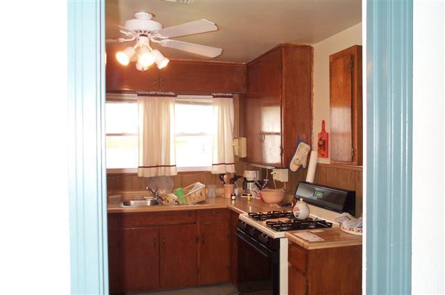 4203 Cline Road Amarillo, TX 79110 - Photo 9 of 11 a kitchen with a sink and a window