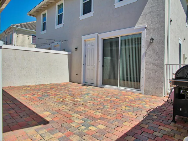 a view of a backyard of a house