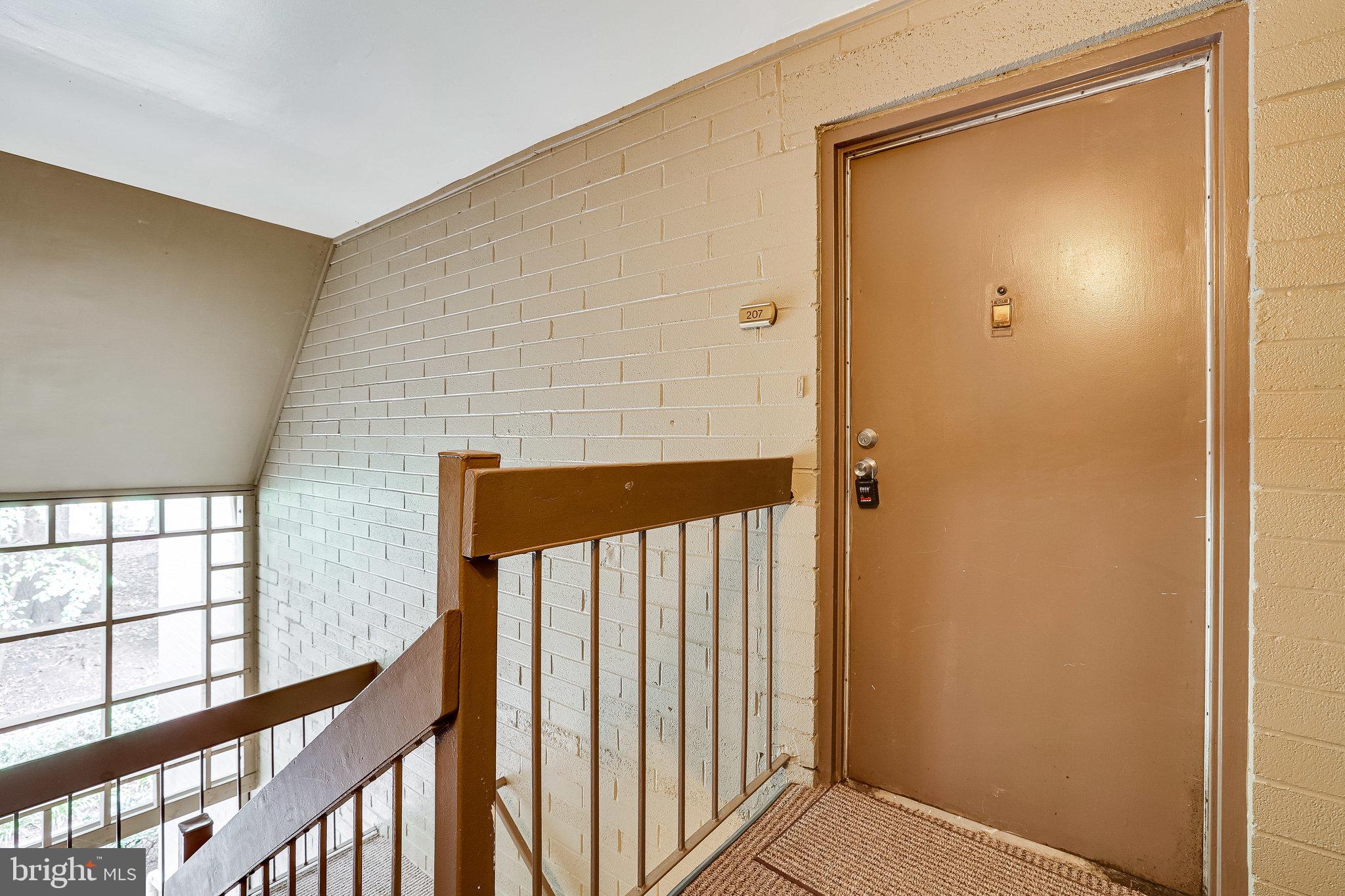 2210 Springwood Drive, Unit 207 Reston, VA 20191 - Photo 26 of 28 Unit Entrance on third floor